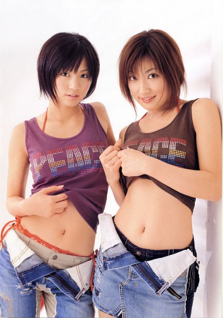 Two stacked and flirtatious gravure idol babes in white lingerie