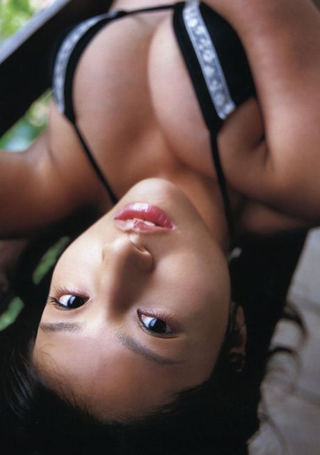 Curvey asian idol with large mouth watering melons in her bikini