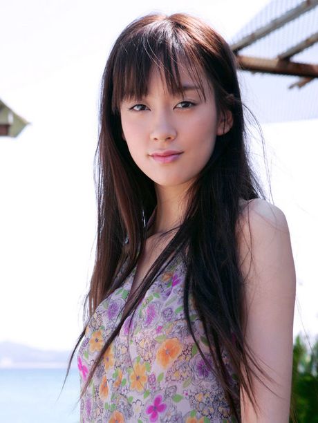 Long haired gravure idol with soft subtle boobs at the beach