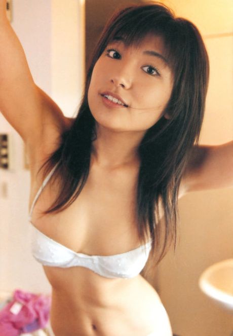 Divine asian babe with plump bouncy boobs in a white bikini