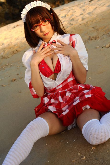 Busty asian babe shows off her tits in her skimpy maid uniform