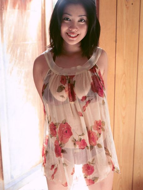 Flirtatious asian idol hides her big boobs in skimpy lingerie