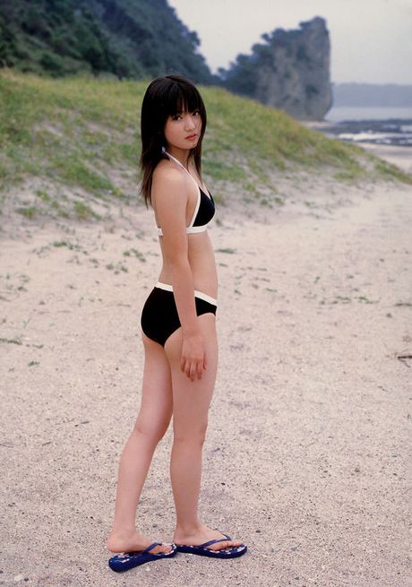 Adorable gravure school girl with pink deliciously kissable lips