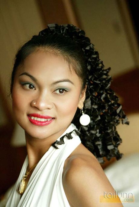 Hot Asian girl Tailynn plays with herself in bed