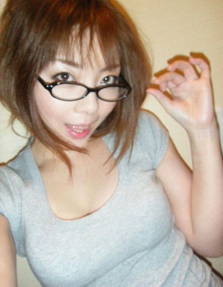 Hot Japanese girlfriend biting on her fingers sensually