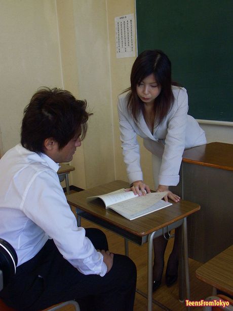 Japanese schoolgirl enjoys the teacher his cock inside her
