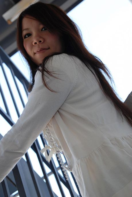 Perky Japanese teen showers and pleasures her pussy