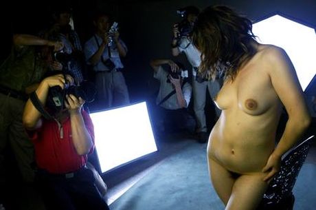 Asian amateur girl with big melons and ass strips and poses outdoors