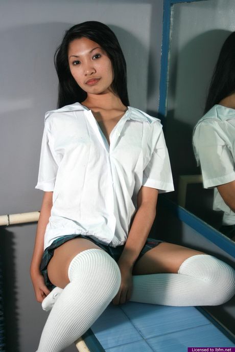 Sexy Maam strips from her school uniform and spreads her legs to finger her pussy