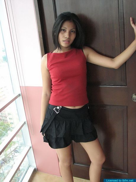 Splendid Asian chick stripping in a brand new glass condo