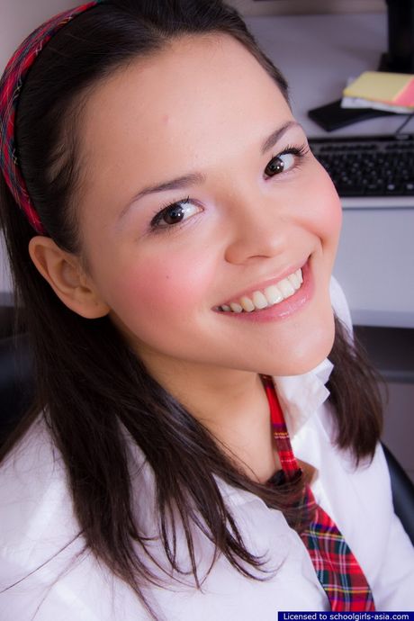 Hot and horny student pleasuring her sex-starved pussy with a big colored dildo