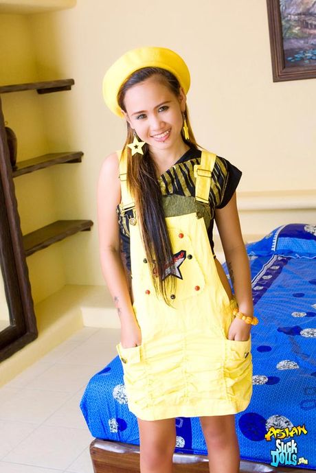 Beautiful Asian girl Beer strips to reveal her amazing perky tits