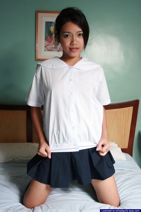 Cute and shy Josya strips from her school uniform to show her neat hairless slit