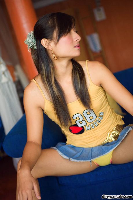 Dirty Pancake is a half British Asian cutie with small tits