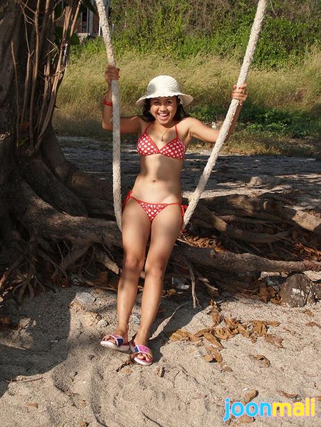 Fun Asian sweetheart Joon Mali in bikini swings outside