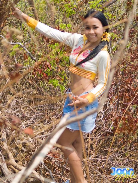 Sweet Joon Mali lifts her skirt and flashes panties outside