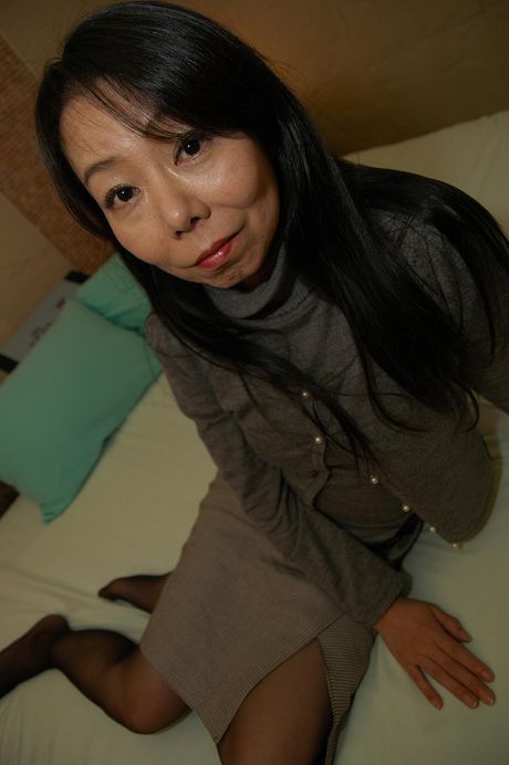 Mature Japanese babe Taeko Syoji submits her pussy to her lover for fucking.