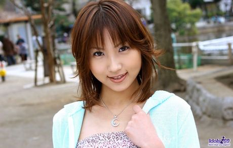 Horny Japanese college girl loves to show off her naked body inthe locker room