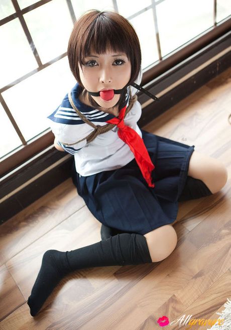 Dimdim Asian in school uniform is tied in ropes and can´t scream