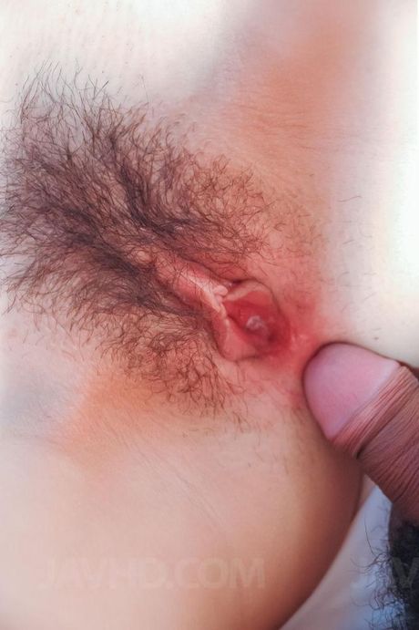 Kosaka Asian is nailed in pink hairy cunt with licked joystick