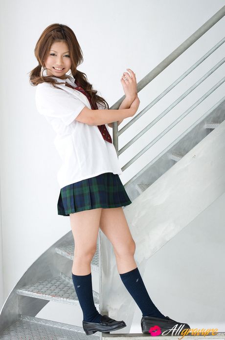 Sasha Asian chick shows pussy in panty under uniform short skirt