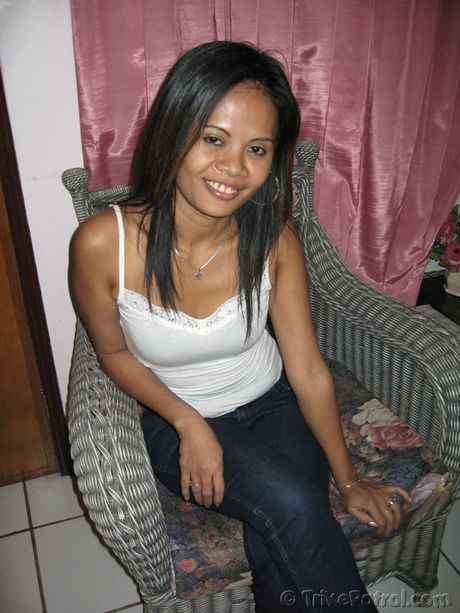 Asian mommy Maureen strips and shows her tiny tits and pink pussy