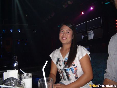 Asian teen Anne strips and shows her tiny tits and ass in a public place