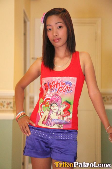 Asian teen Lalaine shows her hairy pussy and small tits in a solo