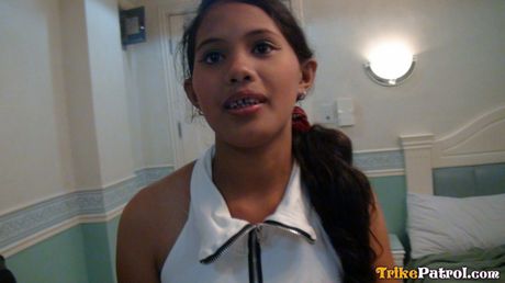 Asian amateur Angel strips and shows her hot butt and tits in a solo