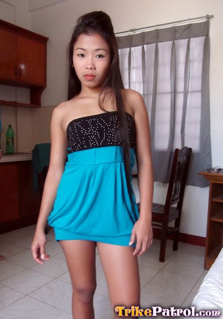 Asian amateur Ashley strips and rubs wet twat while masturbating