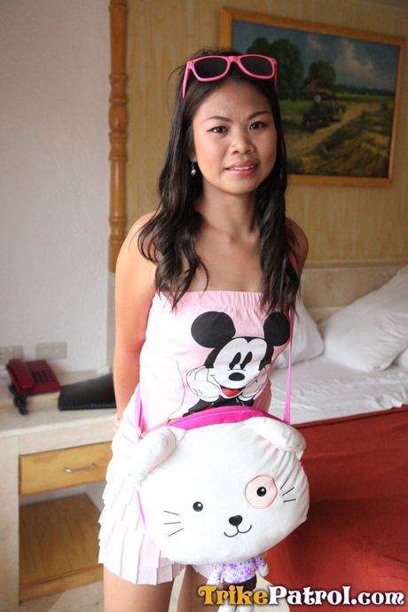 Asian mommy Nicole strips and shows her amazing racks and pussy in a solo