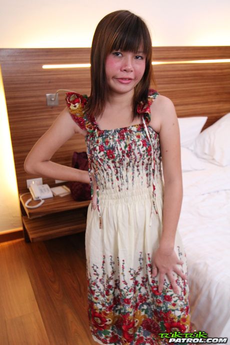 Asian teen Puy strips and shows her sexy booty and tits in a solo