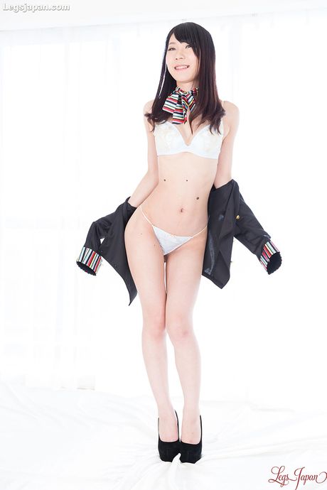 Skinny Asian teen Tojo Aki shows her tiny tits and shaved pussy