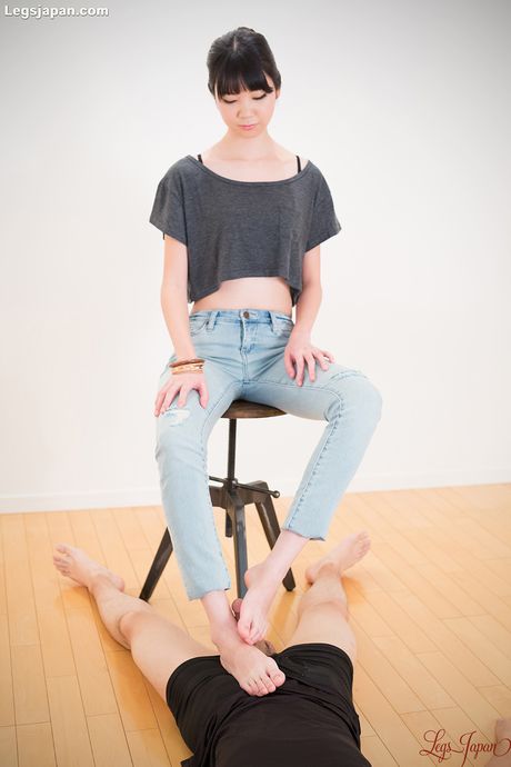 Skinny Asian teen Matsuda Anna strips and shows her tiny tits and feet