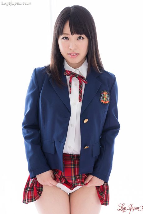 Skinny Japanese schoolgirl Yuka Shirayuki strips and shows her tiny tits