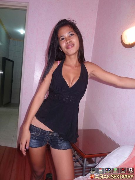 Skinny Asian teen Daisy reveals her tiny tits and toys her pussy