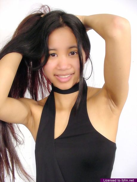 Asian teen amateur girl strips and shows her small tits and ass