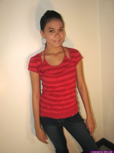 Asian amateur girl with amazing racks and ass strips and exposes herself