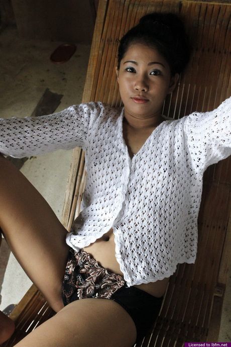 Japanese amateur babe strips and unveils her tiny tits and pink pussy