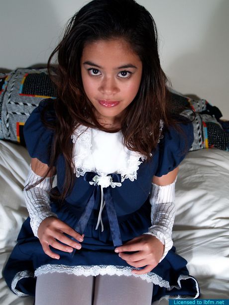 Asian schoolgirl amateur girl strips off and bares her hairy pussy up close