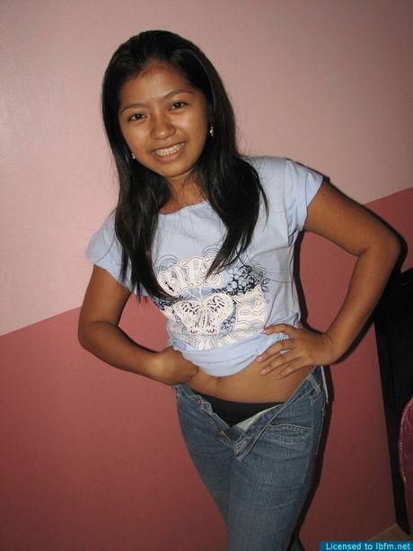 Amateur Asian girl strips and washes her hairy pussy in the shower