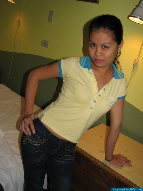 Asian lady with tiny tits strips and shows her hairy cunt