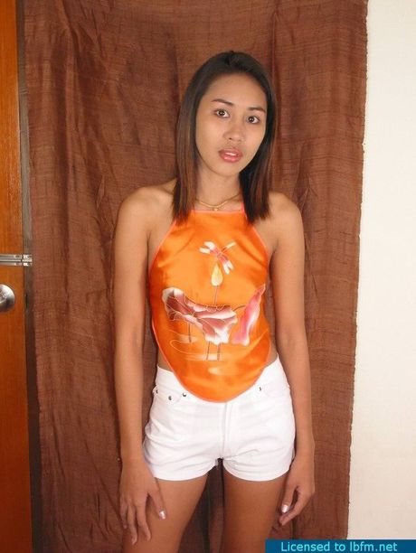 Japanese teen with tiny tits strips and shows her hot ass and pussy