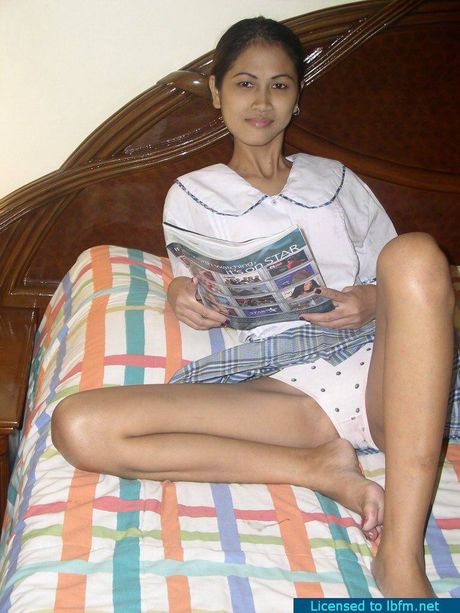 Skinny Asian schoolgirl strips and shows her tiny tits and pussy up close