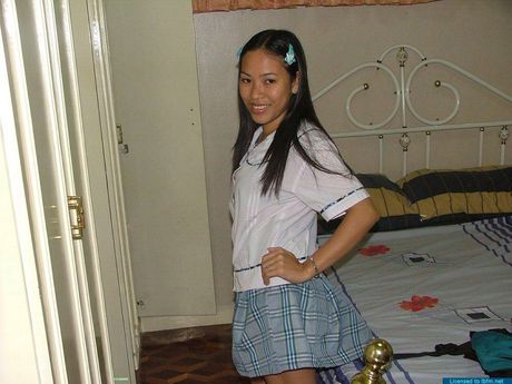 Asian schoolgirl amateur girl strips off and reveals her tiny tits and ass