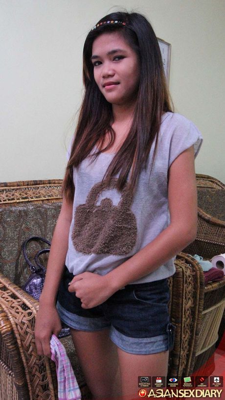 Asian teen Mildred shows her big boobs and hairy cunt in the shower