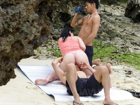 Megumi Haruka with big butt gets dicks in mouth and twat on beach