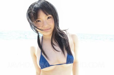 Hina Maeda Asian gives blowjob and rubs tool with feet on beach