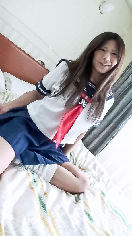 Yukari Asian in sailor gal uniform uses mini vibrator over thong