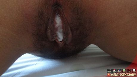 The Asian teen Shakira gets her hairy pussy licked and banged by a horny gu